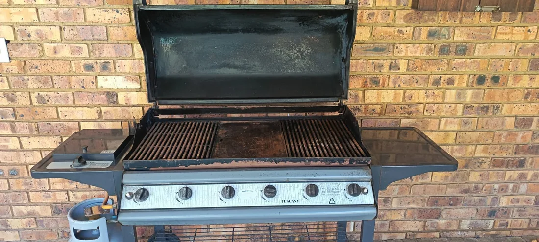 Technician providing gas stove repair service in Ballito